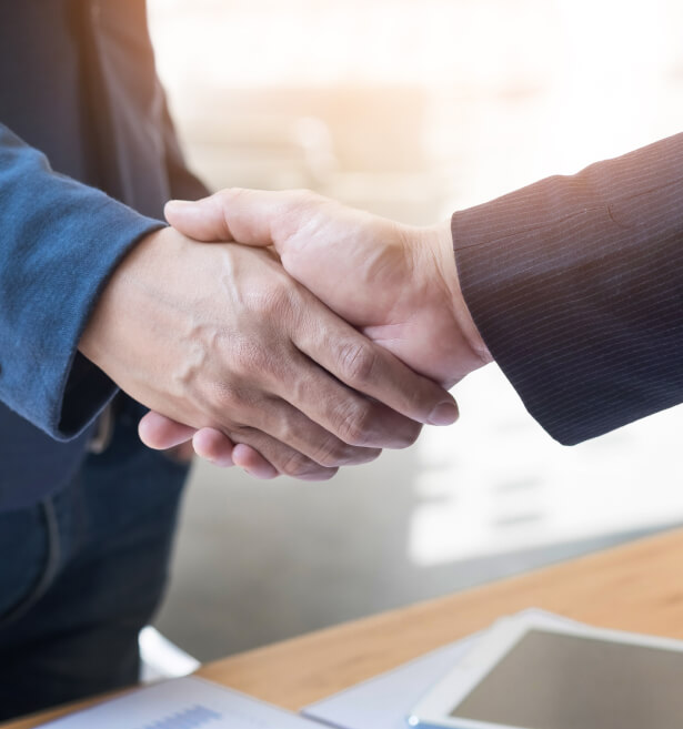 two business people shaking hands