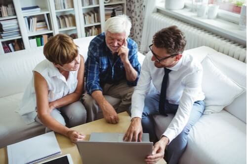 family looking over estate planning documentation on their computer